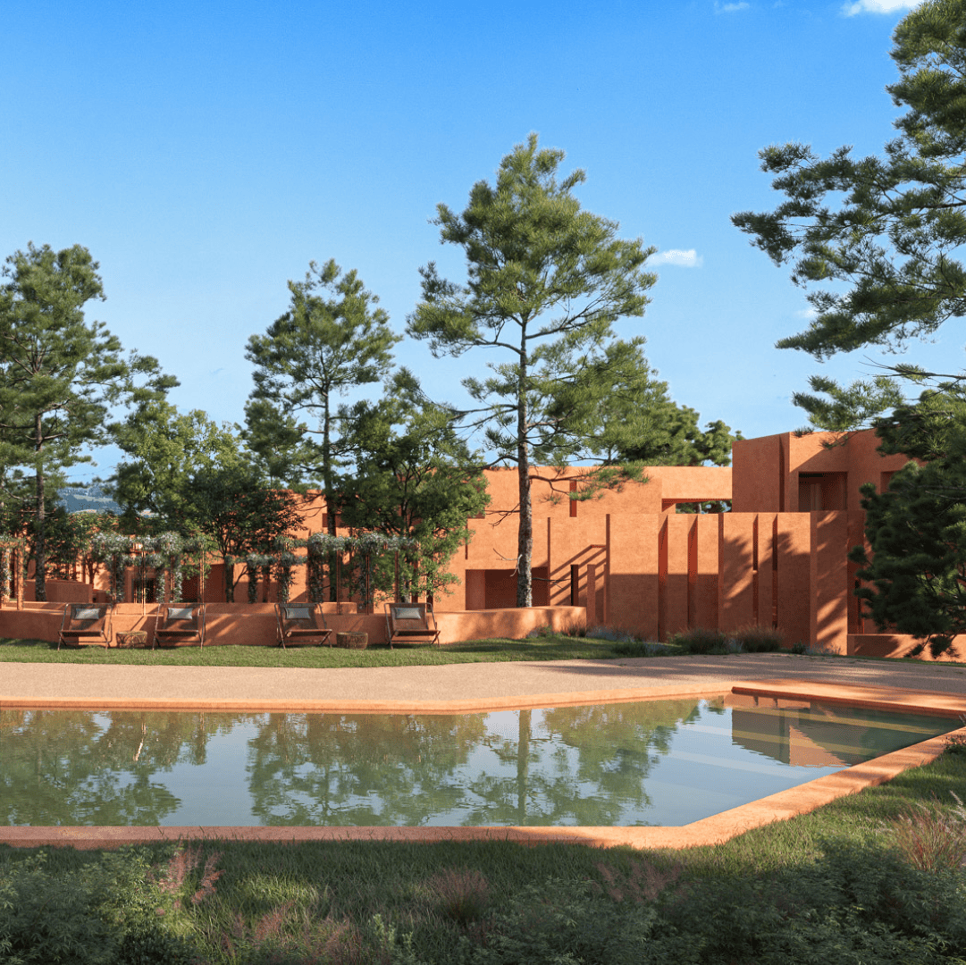 Piscina comunitária com arquitetura terracota e árvores em Palmares.